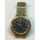 A YELLOW METAL SEIKO WRISTWATCH SEEN WORKING BUT NO WARRANTY