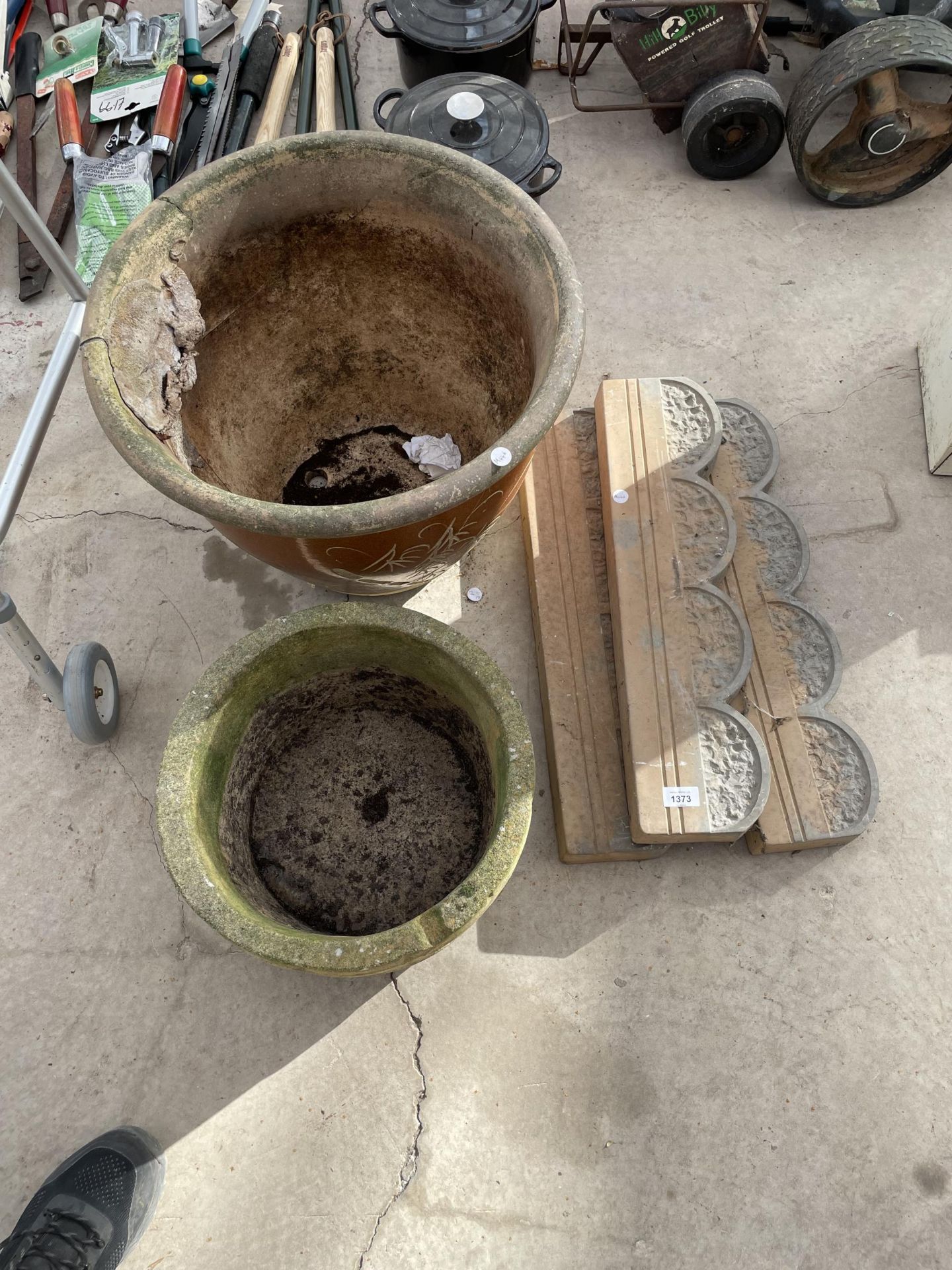 TWO STONEWARE PLANTERS AND THREE SECTIONS OF EDGING STONES