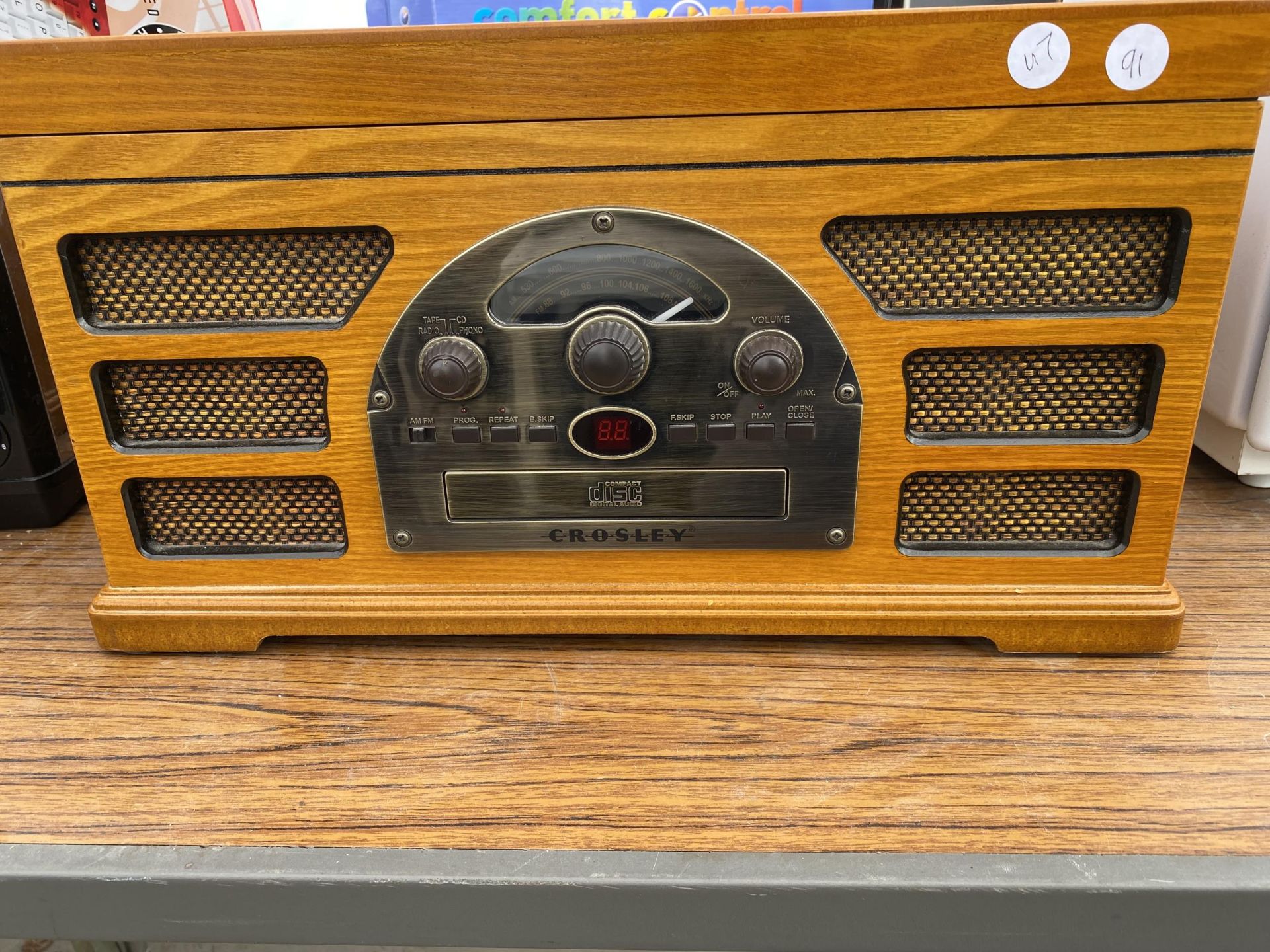 A CROSLEY RECORD PLAYER WITH WOODEN CASING - Image 2 of 4