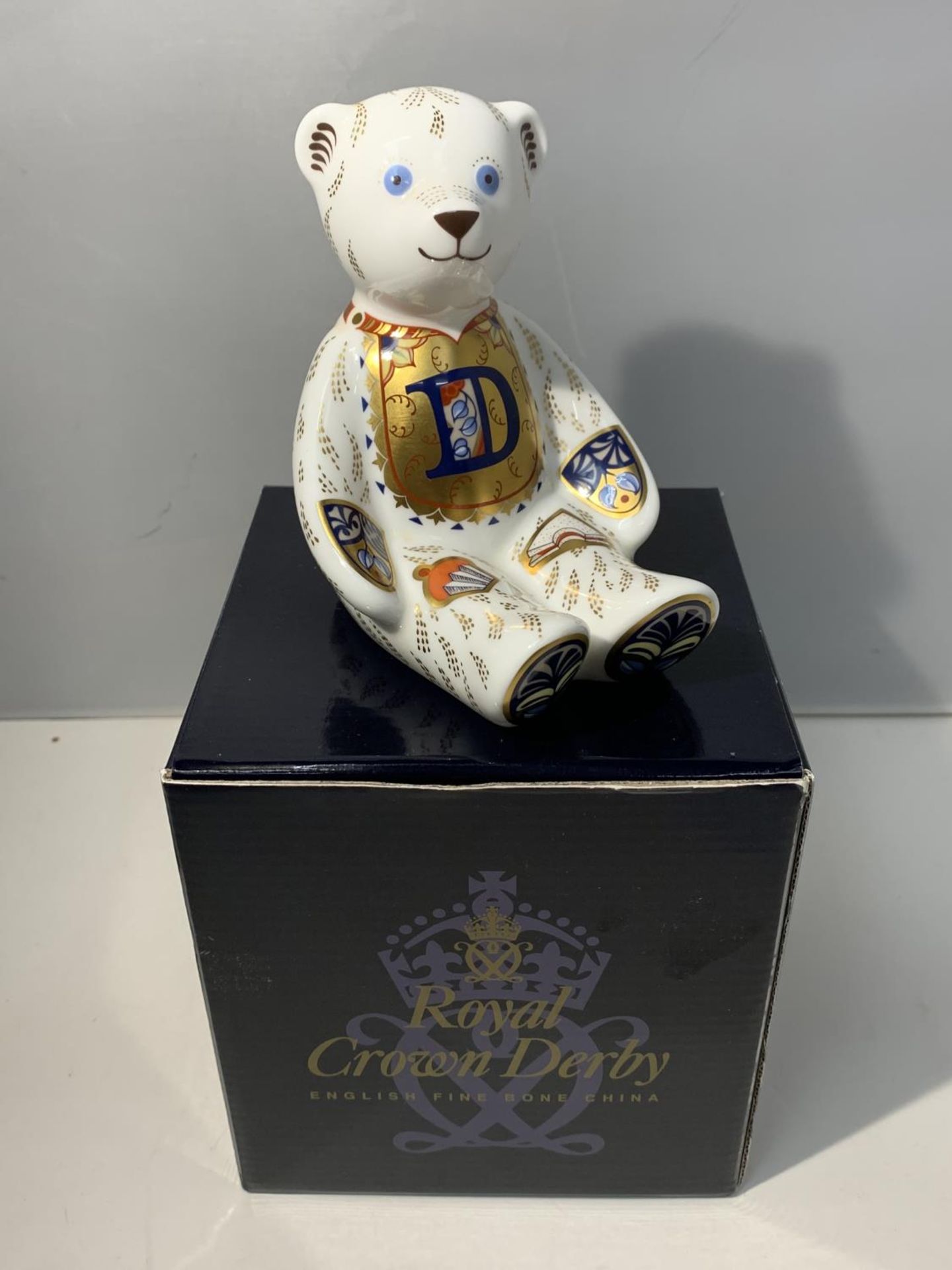 A BOXED ROYAL CROWN DERBY ALPHABET BEAR D WITH GOLD STOPPER