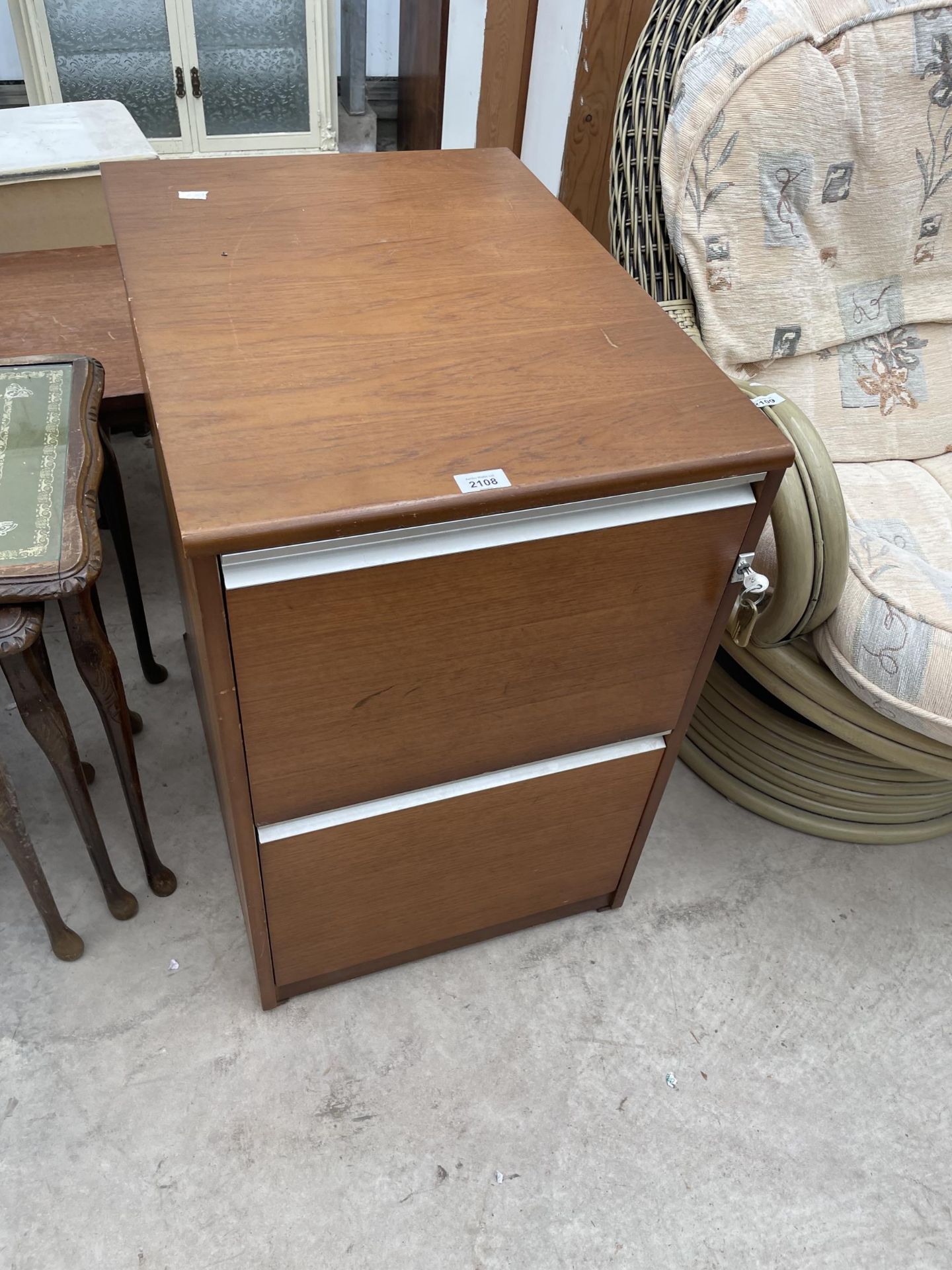 A MODERN TWO DRAWER FILING CABINET