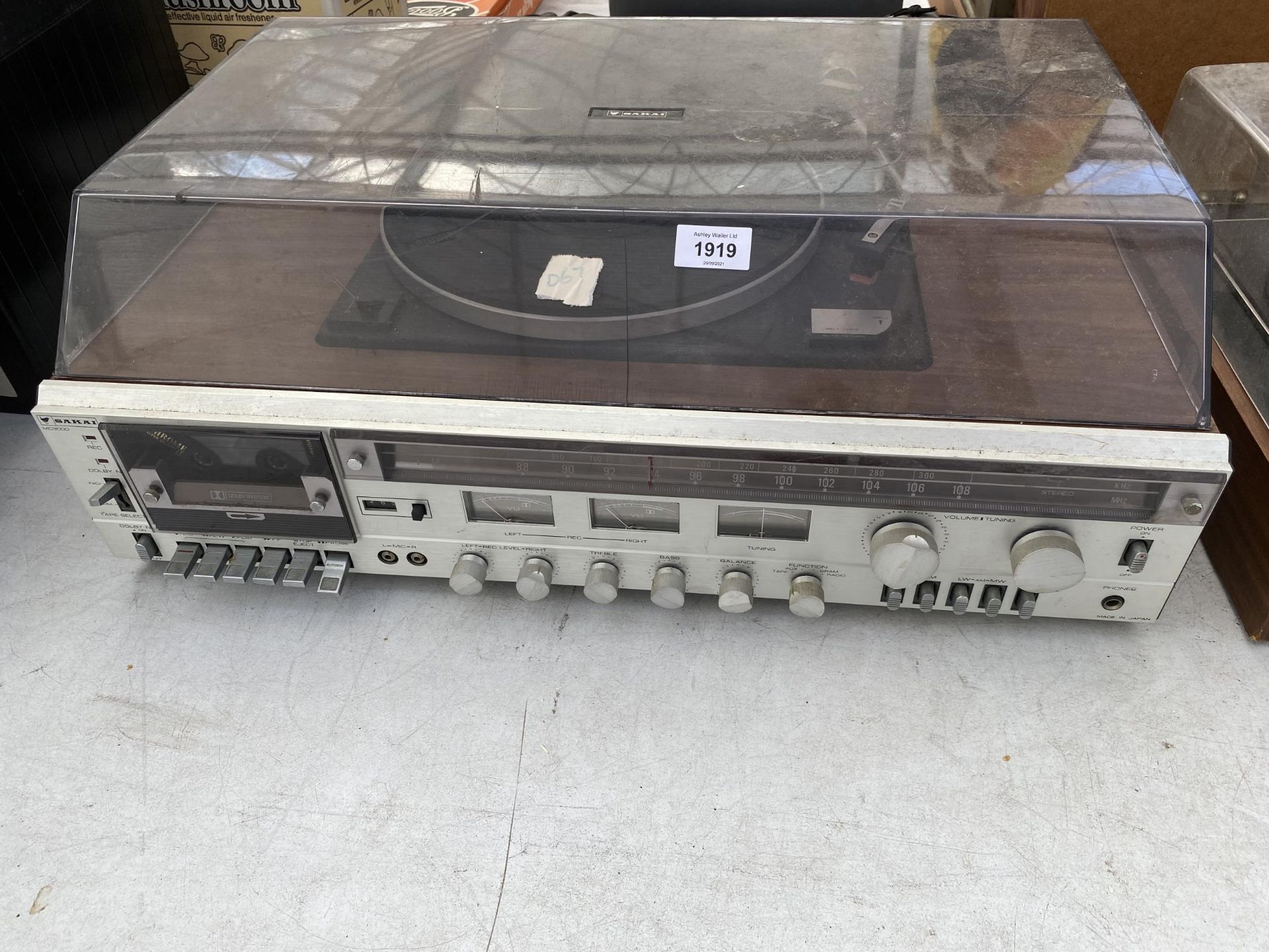 A CASED SAKAI RECORD DECK WITH TUNER AND TAPE DECK