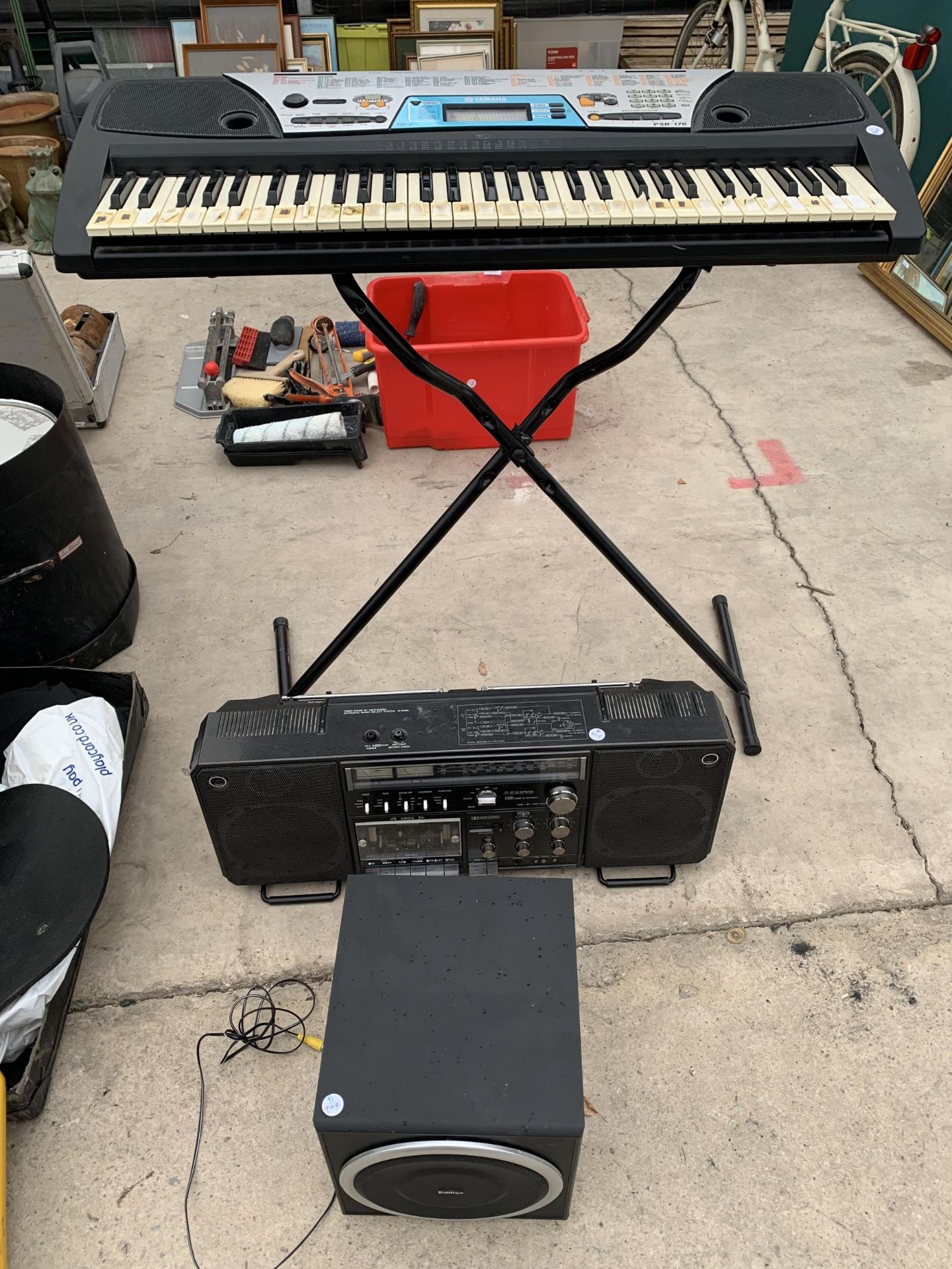 A YAMAHA ORGAN, SANYO STEREO RECORDER AND AN EDIFIER SPEAKER