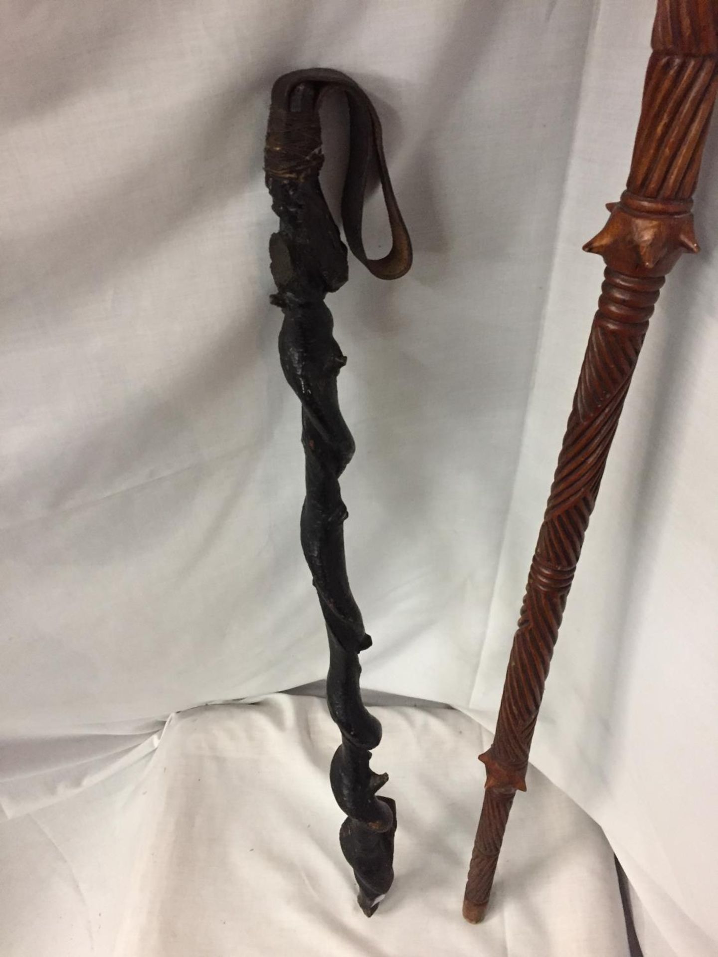 A SHILLELAGH IRISH BLACKTHORN STICK AND AN ORIENTAL WOODEN STICK - Image 2 of 4