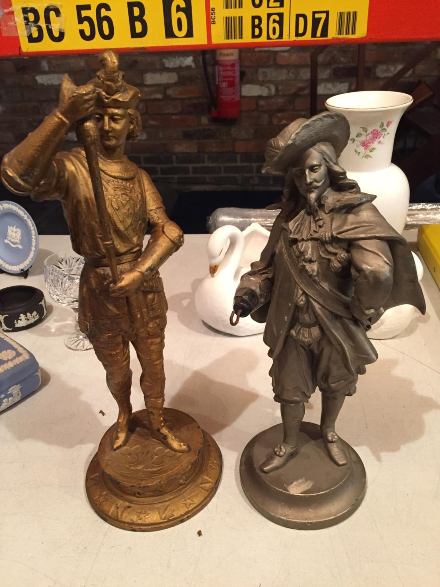 TWO FIGURINES ONE DEPICTING CAPTAIN HOOK