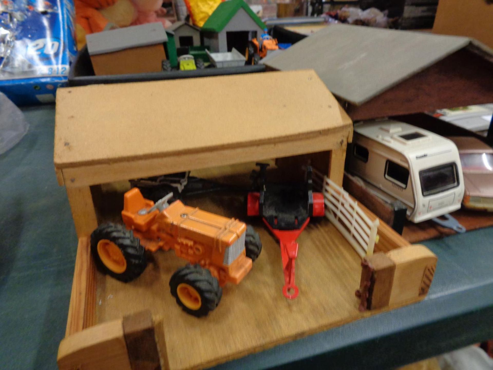 A WOODEN FARM YARD WITH BUILDINGS TO INCLUDE VEHICLES- A TRACTOR AND TRAILERS, CARAVAN,CAR - Image 2 of 4