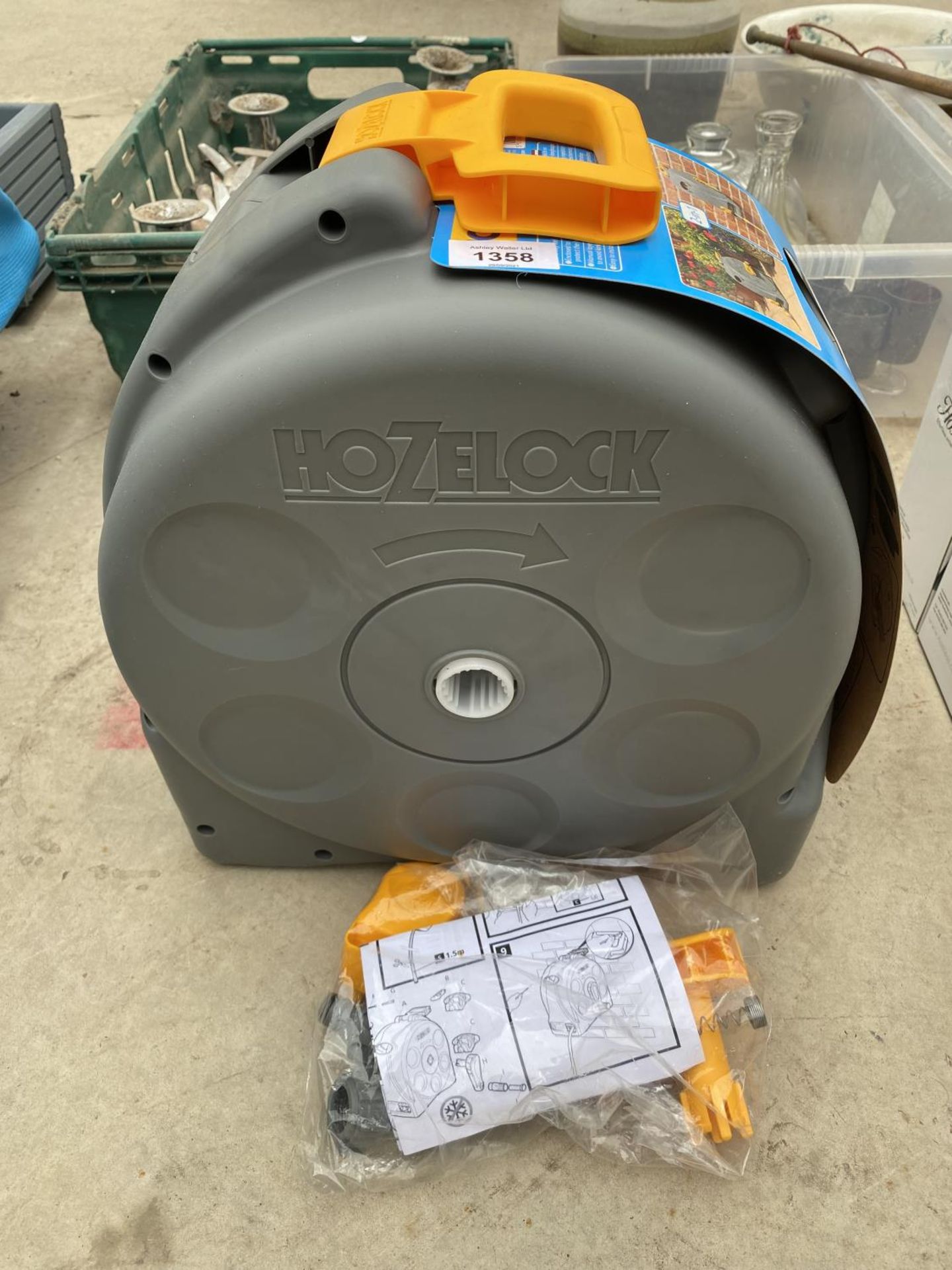 A HOZELOCK REEL AND FURTHER FITTINGS