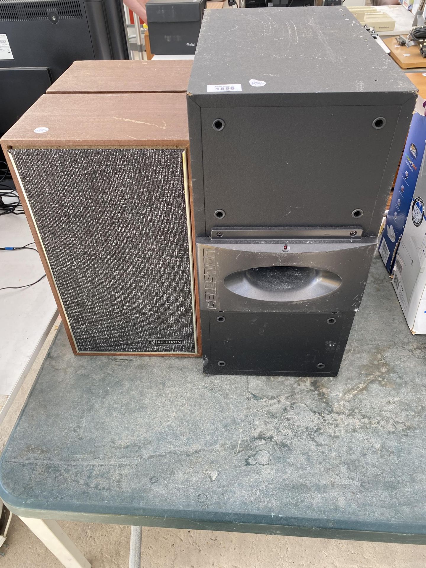 A CELESTION SUB WOOFER AND TWO WOODEN CASED SPEAKERS