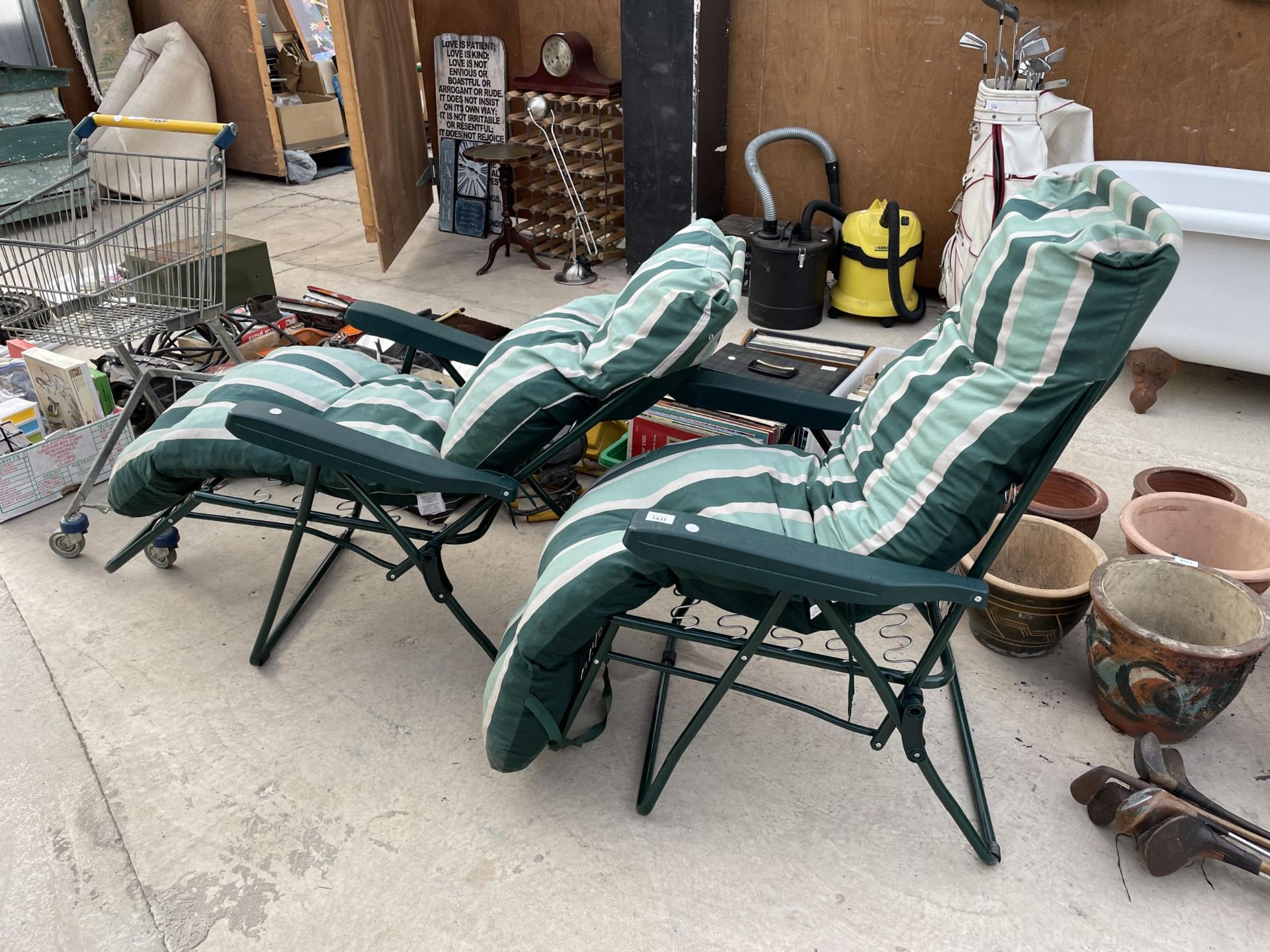 TWO FOLDING RECLINING GARDEN CHAIRS