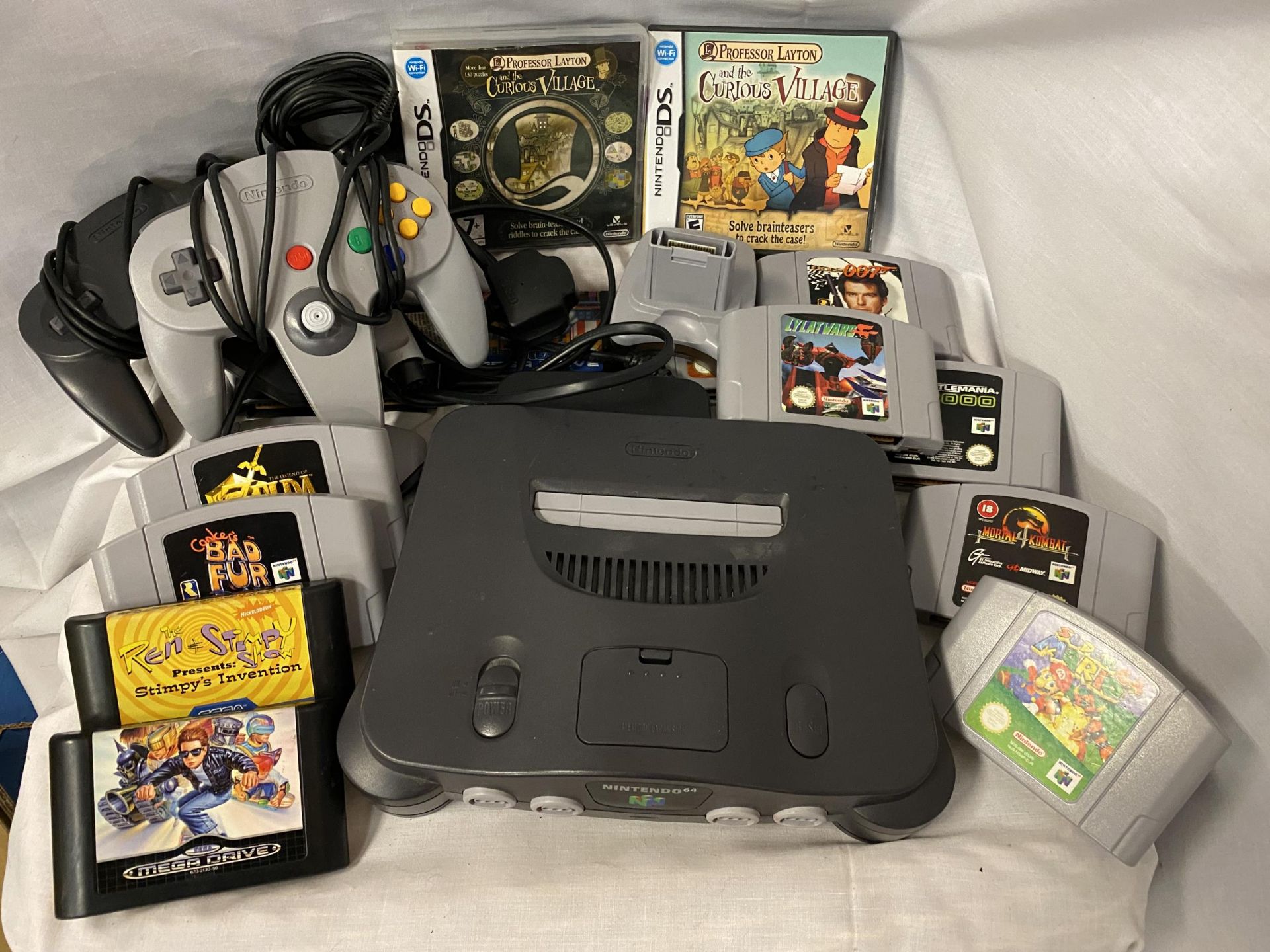 A VINTAGE NINTENO 64 WITH CONTROLLERS AND GAME CARTRIDGES