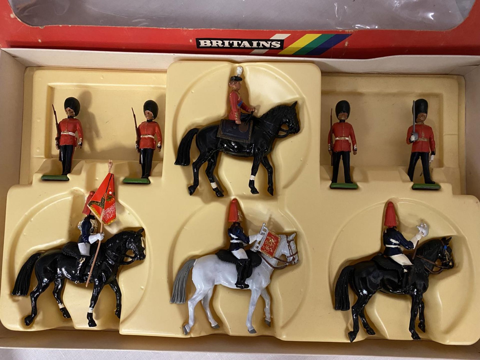 A BOXED BRITIANS HER MAJESTY THE QUEEN WITH HORSEGUARDS EIGHT PIECE MODEL SOLDIER SET - NUMBER - Image 2 of 6