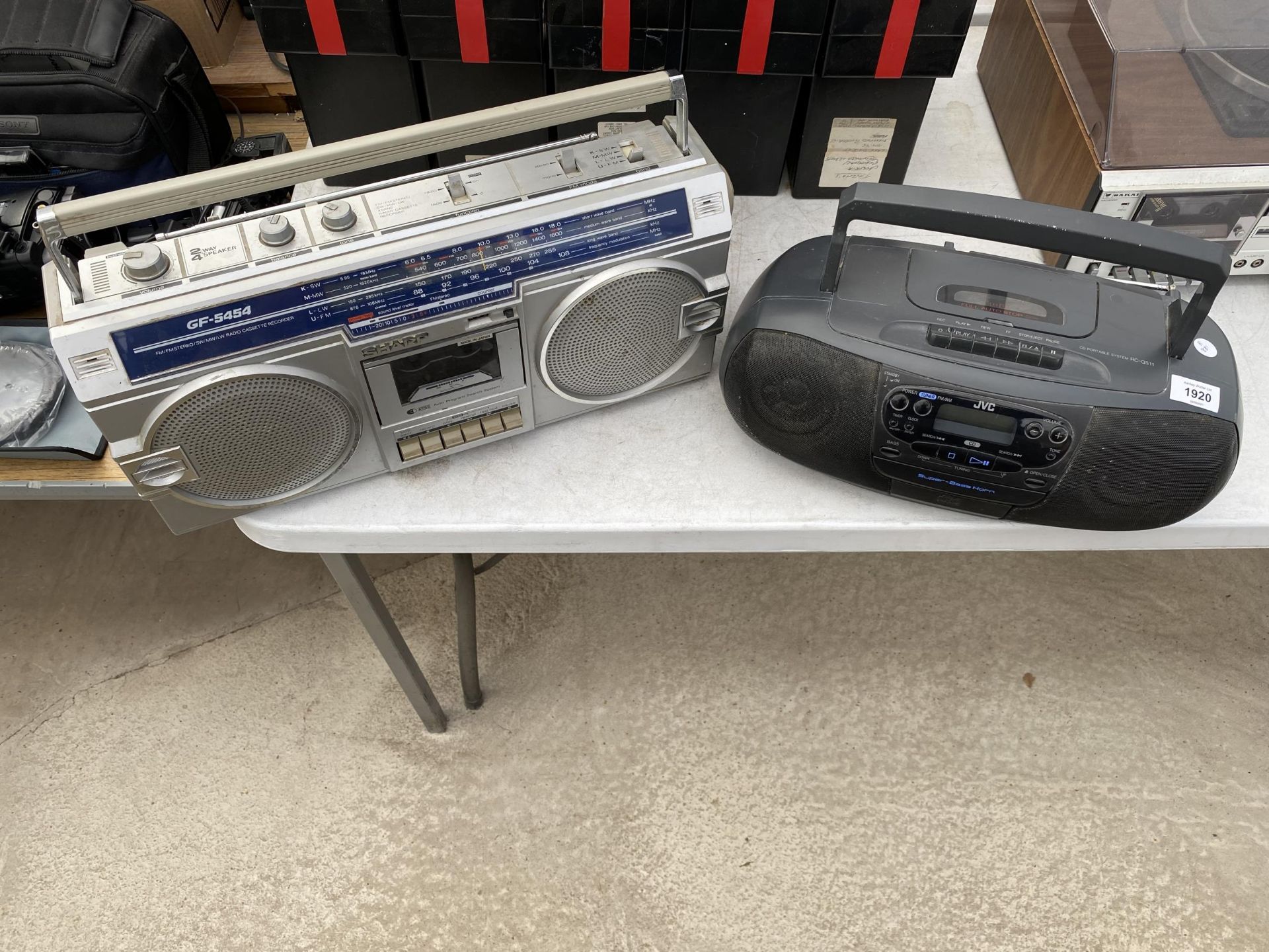 A SHARP GF-5454 FM STEREO SYSTEM AND A FURTHER JVC RADIO