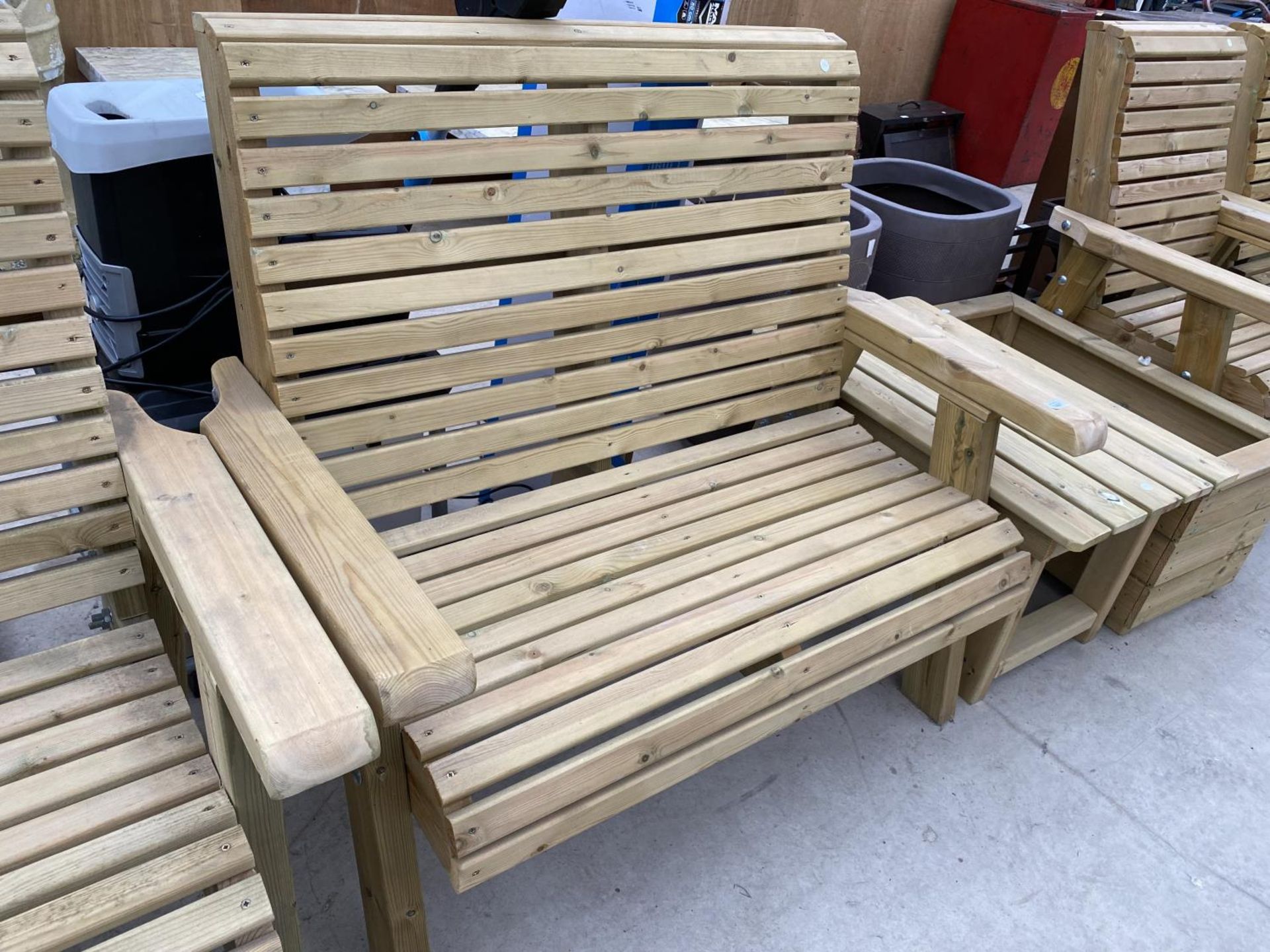 A WOODEN GARDEN FURNITURE SET TO INCLUDE A TWO SEATER BENCH, A CHAIR AND A PLANTER - Image 2 of 4