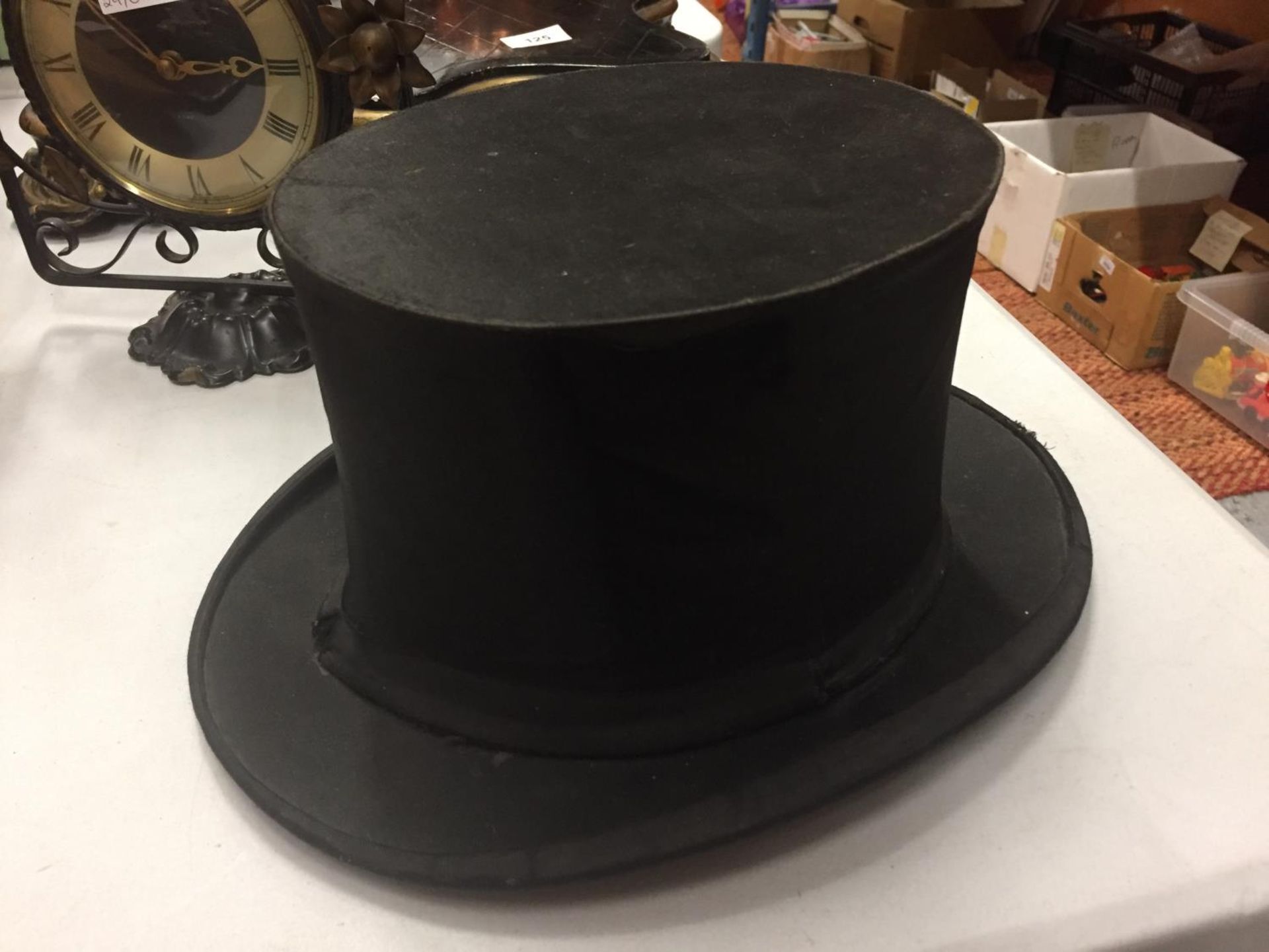 A VINTAGE FRENCH OPERA COLLAPSIBLE SATIN TOP HAT