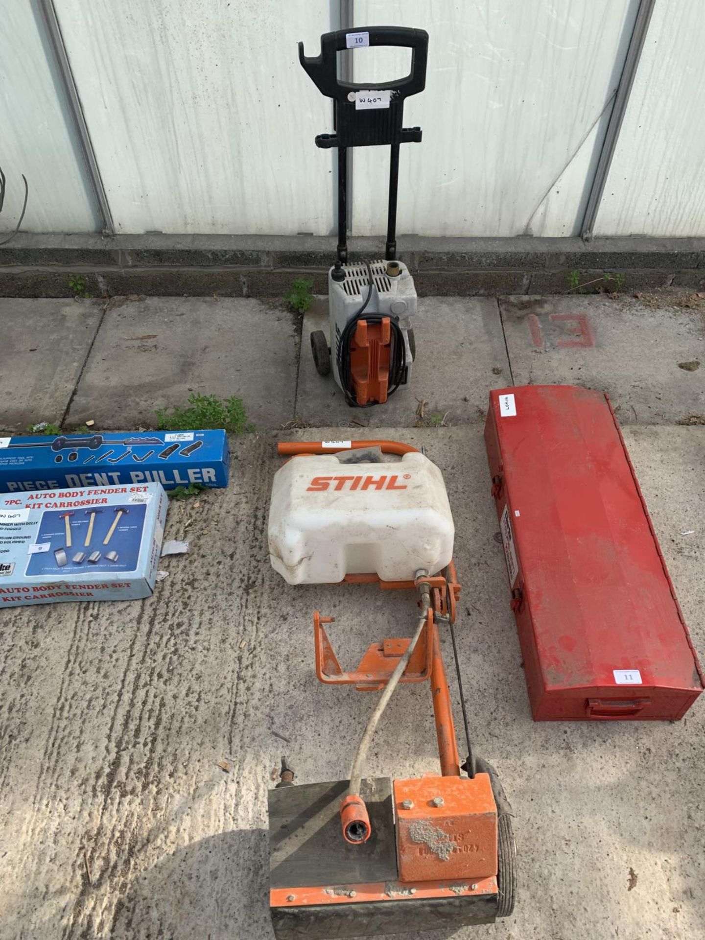 A STIHL PRESSURE WASHER AND A STIHL CONCRETE SAW TROLLEY - NO VAT