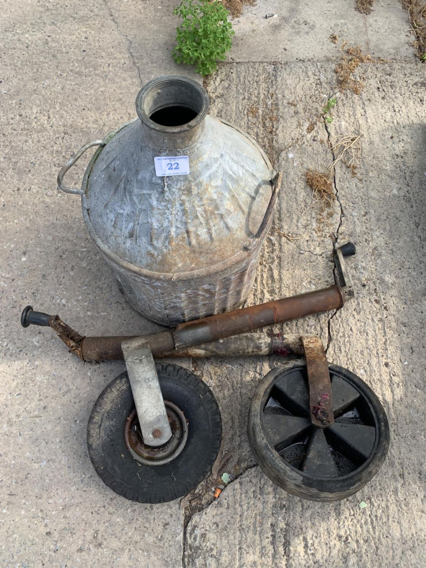TWO JOCKEY WHEELS AND A GALVANISED TWIN HANDLED SMALL CHURN + VAT