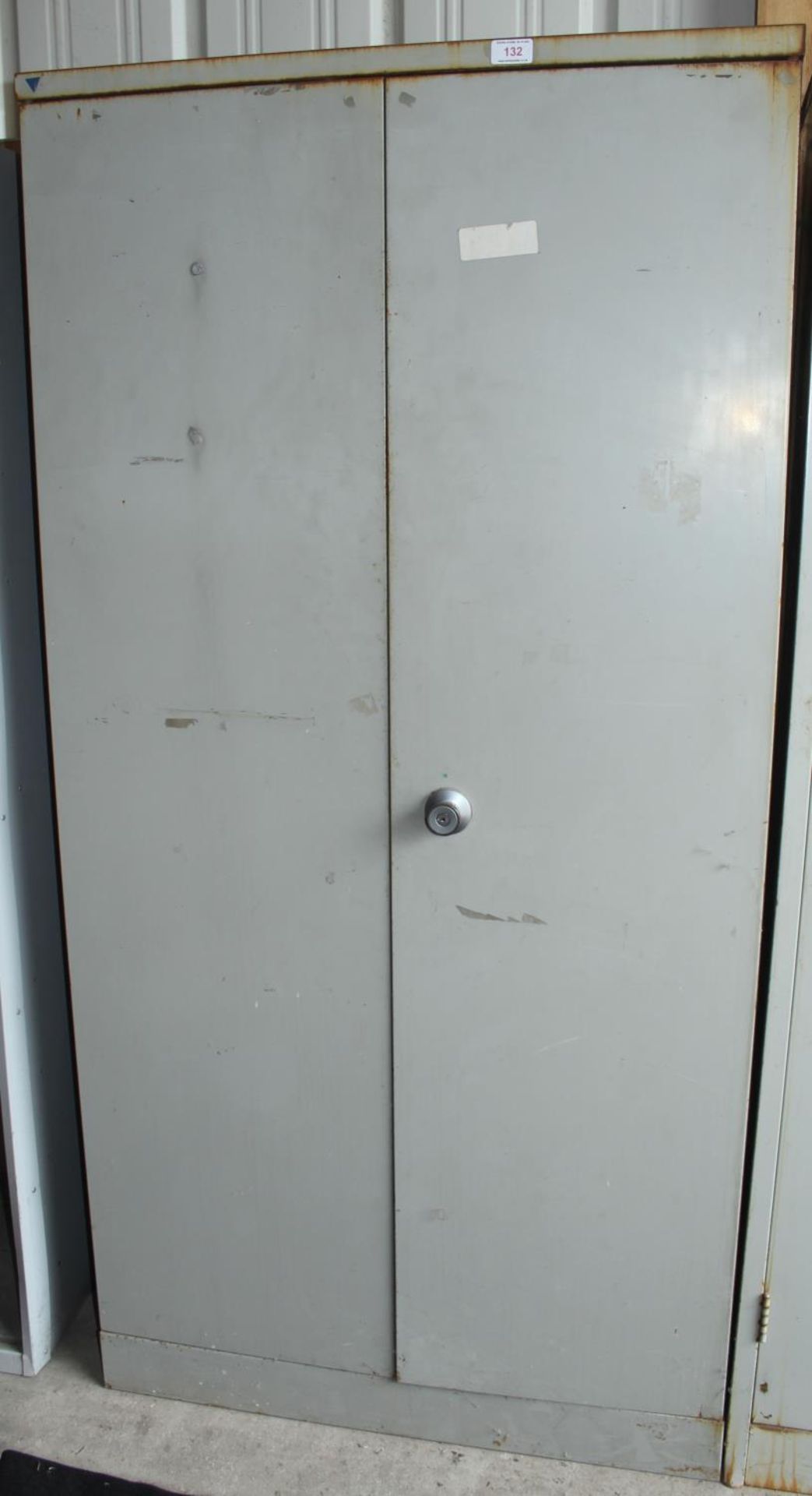 A METAL CUPBOARD