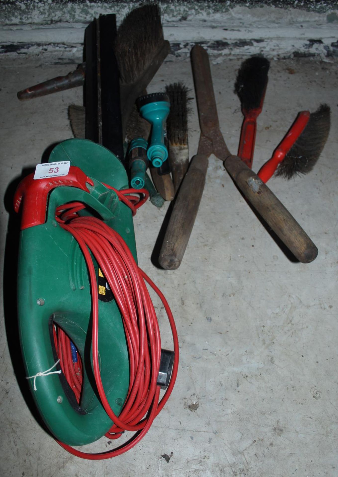 A SET OF HEDGE TRIMMERS, BRUSHES AND SHEARS