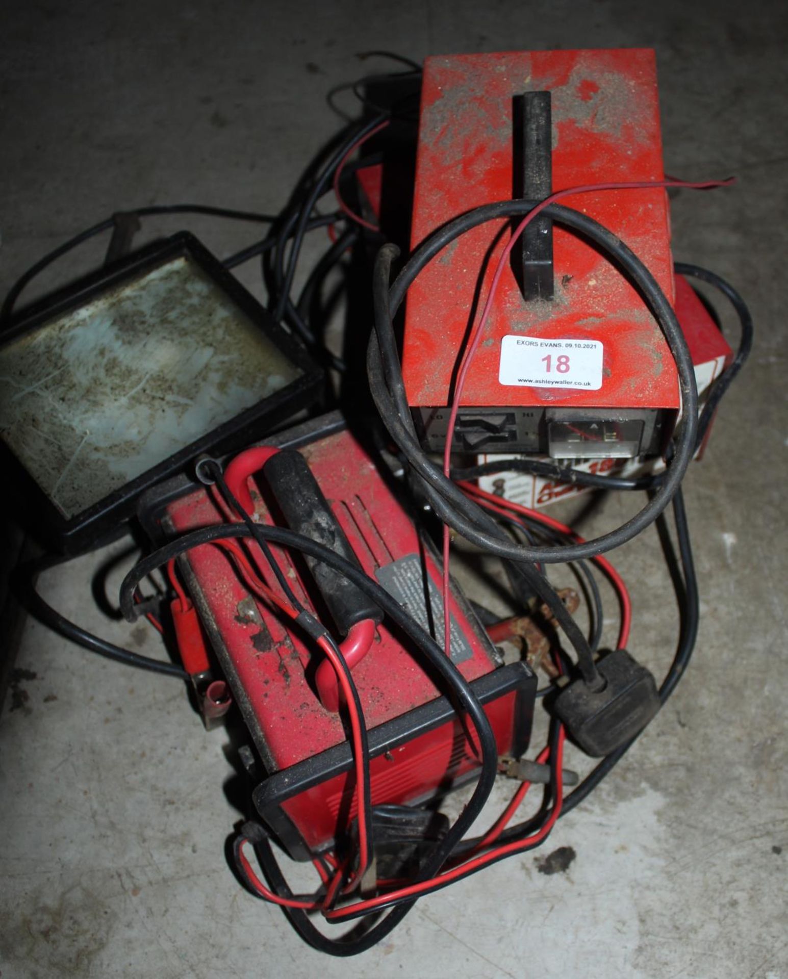 THREE BATTERY CHARGERS & SEARCH LIGHT