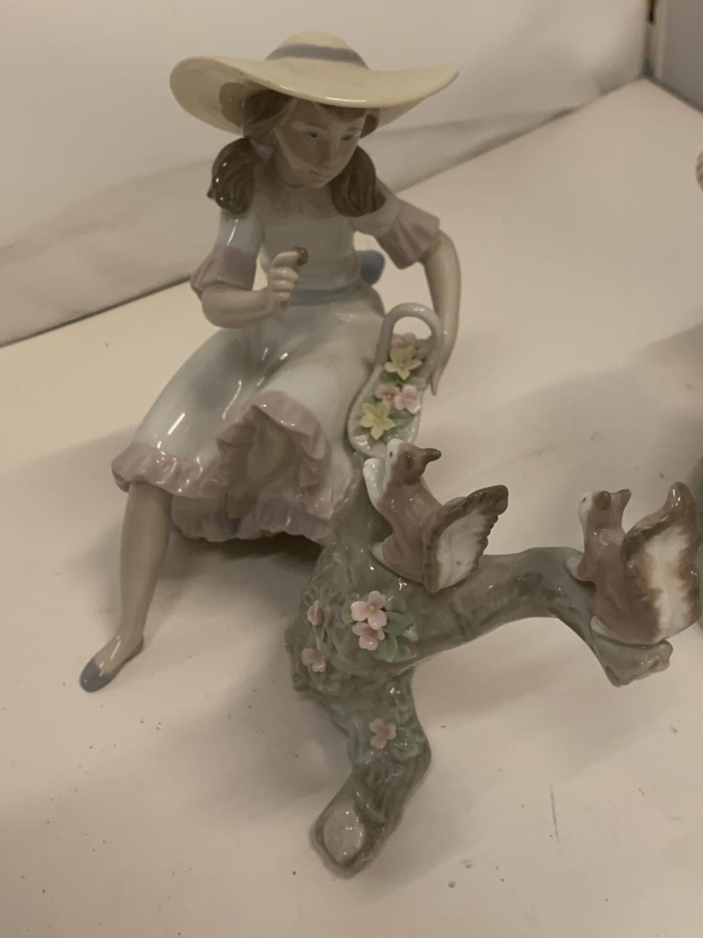 TWO LLADRO FIGURINES, ONE OF A BOY AND GIRL ON A SEE-SAW, THE OTHER OF A GIRL WITH A BASKET OF - Image 3 of 5