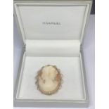 A CAMEO BROOCH WITH A ROLLED GOLD SURROUND IN A PRESENTATION BOX