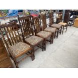 A SET OF FOUR EARLY 20TH CENTURY OAK BARLEYTWIST DINING CHAIRS, ONE SIMILAR CHAIR AND A BEDROOM