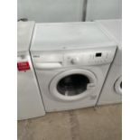 A WHITE BEKO WASHING MACHINE