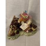 A ROYAL DOULTON THE AUTUMN STORY OLD MRS EYEBRIGHT FIGURINE