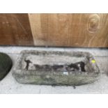 A STONE TROUGH - APPROXIMATELY 75 CM WIDE