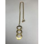 A 9 CARAT GOLD NECKLACE AND THREE HEART PENDANT MARKED 375 GROSS WEIGHT 4.7 GRAMS