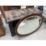 AN OVAL OAK WALL MIRROR AND BLANKET CHEST