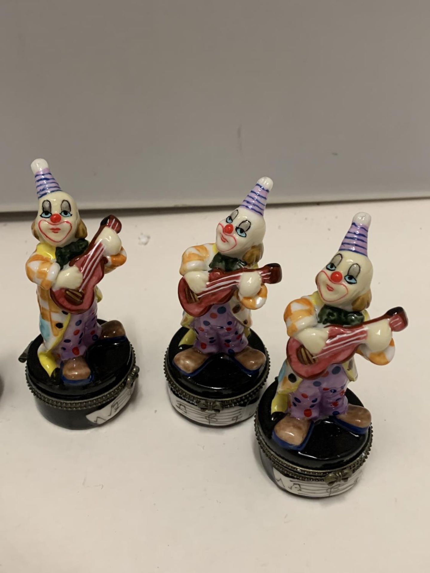 SIX TRINKET BOXES EACH WITH A GLASS CLOWN PLAYING GUITAR FIGURE - Image 2 of 3