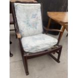 A PARKER KNOLL ROCKING CHAIR - NUMBER PK 1016/7/8/9