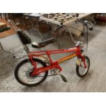 A VINTAGE MARK 3 RED CHOPPER BIKE IN EXCELLENT CONDITION