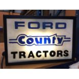 A FORD COUNTY TRACTORS ILLUMINATED LIGHT BOX SIGN