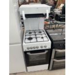 A WHITE FREESTANDING MONTPELLIER OVEN AND HOB WITH UPPER GRILL