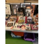 A LARGE COLLECTION OF MAINLY ELVIS PRESLEY MEMORABILIA TO INCLUDE BOOKS, CDS, DVDS, PICTURES ETC