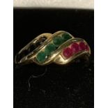 A 9 CARAT GOLD RING WITH TWELVE COLOURED STONES SIZE Q GROSS WEIGHT 2.8 GRAMS