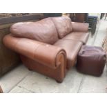 A MODERN KLAUSSNER LEATHER SETTEE AND SIMILAR POUFFE