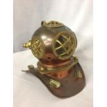 A COPPER AND BRASS DEEP SEA DIVERS HELMET ORNAMENT HEIGHT 17CM, WIDTH 20CM