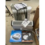 AN ASSORTMENT OF HEATERS TO INCLUDE TWO BOXED FAN HEATERS AND TWO OIL FILLED HEATERS ETC