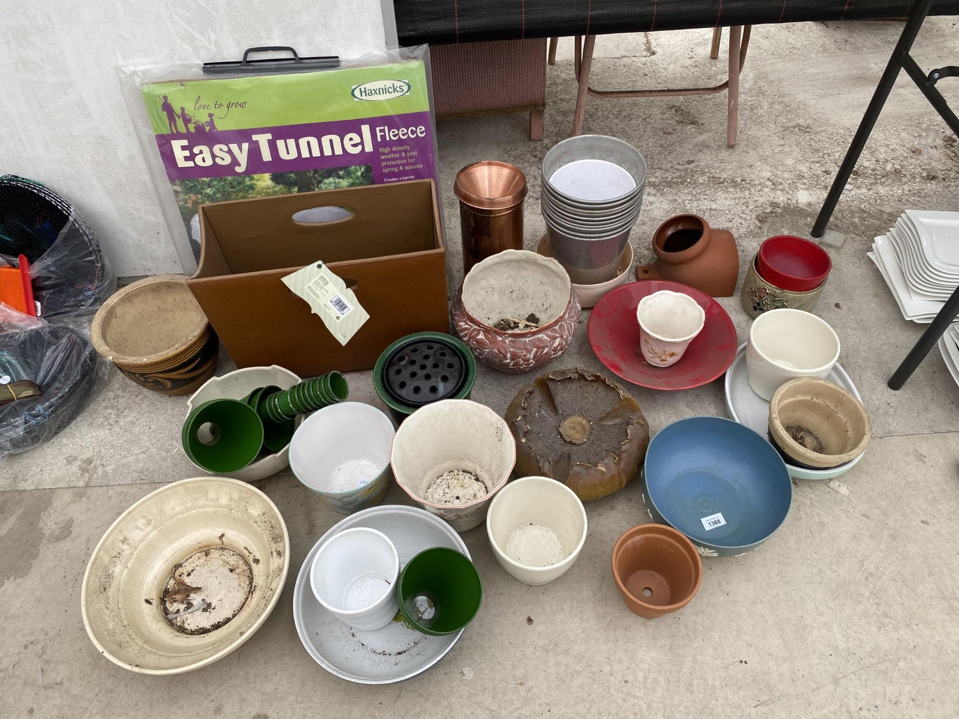 A LARGE ASSORTMENT OF VARIOUS PLANTERS AND PLANT POTS