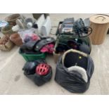 A LARGE QUANTITY OF HORSE TACK TO INCLUDE RIDING HATS, RIDING BOOTS AND HEAD COLLARS ETC