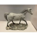 A BESWICK RARE DAPPLE GREY HORSE ON A CERAMIC PLINTH ASLO STAMPED BESWICK