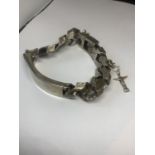 A VERY HEAVY IDENTITY BRACELET WITH A SAFETY CHAIN AND A CHARM OF THE CHRIST THE REDEEMER GROSS