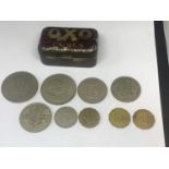 A VINTAGE OXO TIN WITH NINE VARIOUS OLD COINS