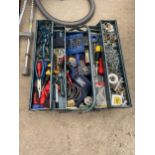 A METAL TOOL BOX CONTAINING A LARGE ASSORTMENT OF TOOLS AND HARDWARE TO INCLUDE AN ELECTRIC DRILL,