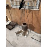 A VINTAGE CAST IRON COULDRON/KETTLE WITH STAND AND CHAIN