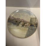 A CABINET PLATE HANDPAINTED AND SIGNED WITH THE DEE BRIDGE CHESTER