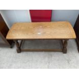 A JACOBEAN STYLE OAK COFFEE TABLE, 41.5 X 17"